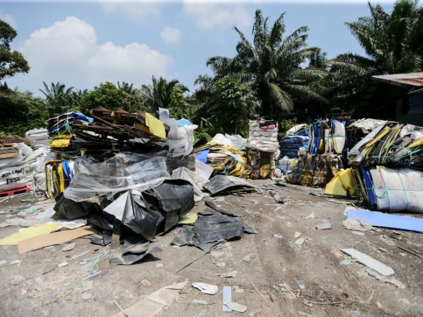 The site of an alleged illegal Chinese plastic recycling plant in Selangor, Malaysia. Many errant recycling firms, believed to be from China and operating without permits, are using Malaysian landfills to illegally dump toxic plastic waste.