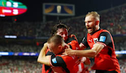 Austria and Algeria advance to World Cup round of 32, Iran eliminated