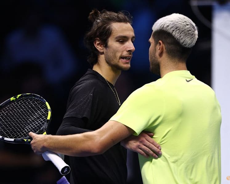 Alcaraz clinches year-end top spot with ATP Finals win over Musetti