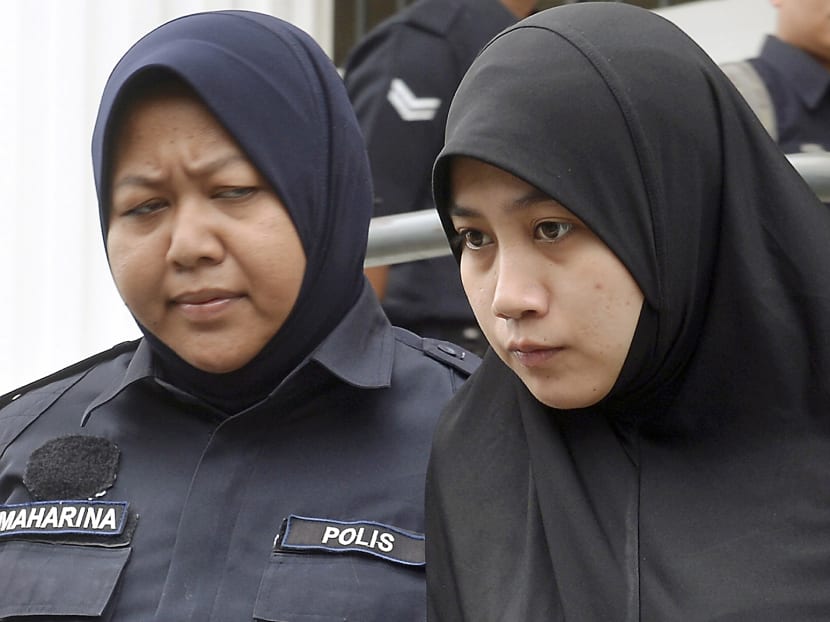 Ummi Kalsom Bahak (right) was charged before the Sepang Sessions Court for allegedly supporting the Islamic State militant group.