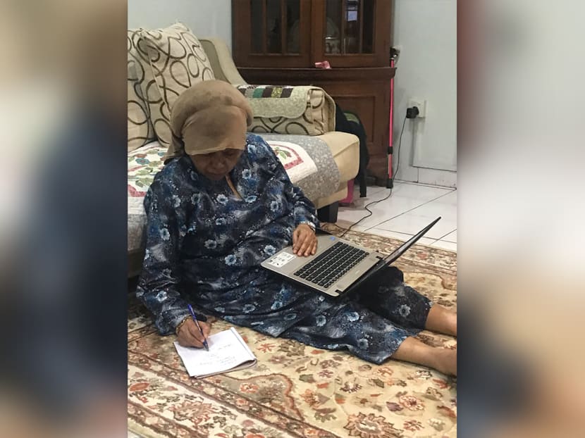 Mr Adam Zainal took a photo of his 83-year-old grandmother planning next year's syllabus for the kindergarten where she works. Mr Adam Zainal took a photo of his 83-year-old grandmother planning next year's syllabus for the kindergarten where she works.