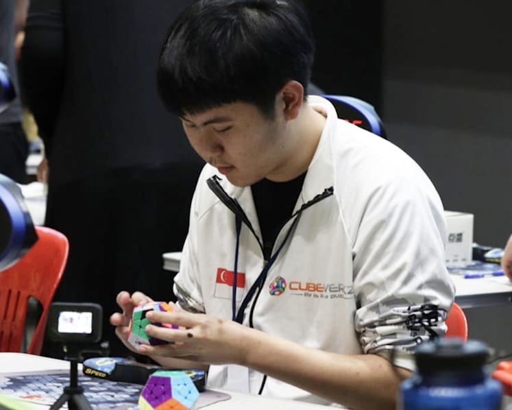 S'pore student crowned world champion at 12-sided Rubik's puzzle after honing skill to fend off boredom during Covid-19