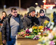 Tears and stunned silence at vigil for Swiss fire victims