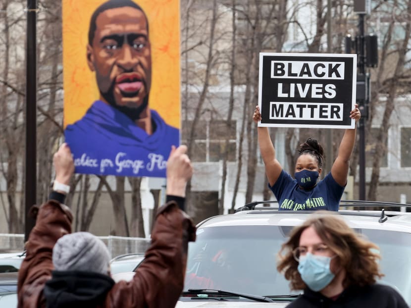 People react after the verdict was read in the Derek Chauvin trial in Minneapolis, Minnesota, US on April 20, 2021.