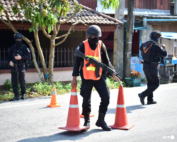 Dozens of attacks in Thailand's restive south leave 2 injured