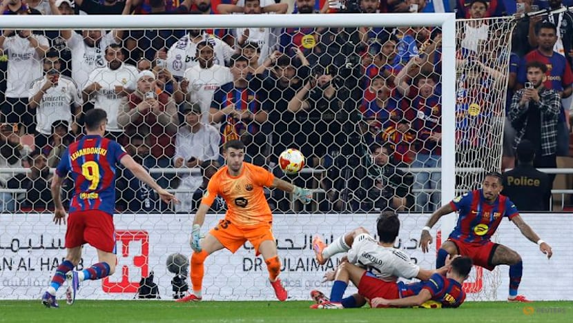 Raphinha strikes twice as Barcelona edge Real Madrid in heated Spanish Super Cup final