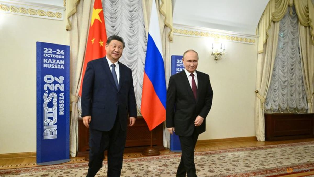 Putin trip aims to show China ties unshakeable after Trump's grand welcome