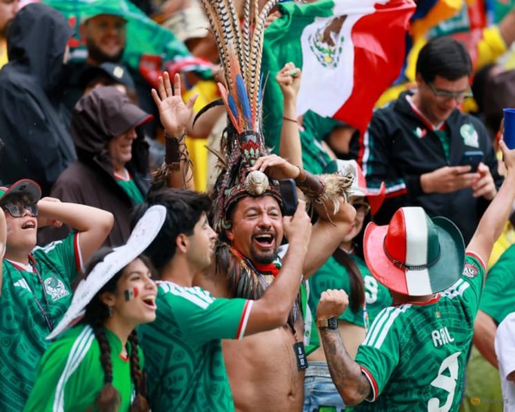 Mexicans celebrate breaking opening day curse with 2-0 win