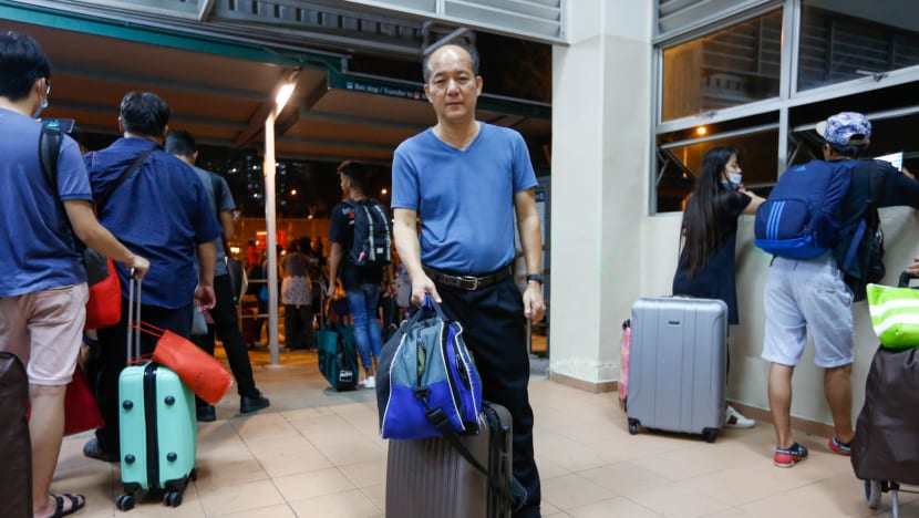 Malaysians brave long queues and traffic jams to beat the clock and avoid lockdown