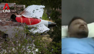 Survivor of Air India plane crash jumped out of emergency exit: Indian police | Video