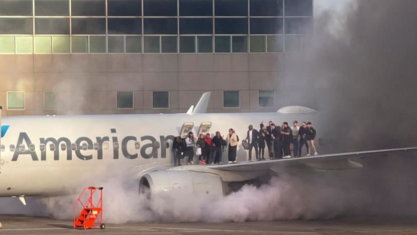 American Airlines jet engine catches fire after landing in Denver, passengers evacuated American Airlines jet engine catches fire after landing in Denver, passengers evacuated