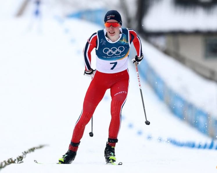 Nordic Combined-Norway's Oftebro skis from behind to first individual gold
