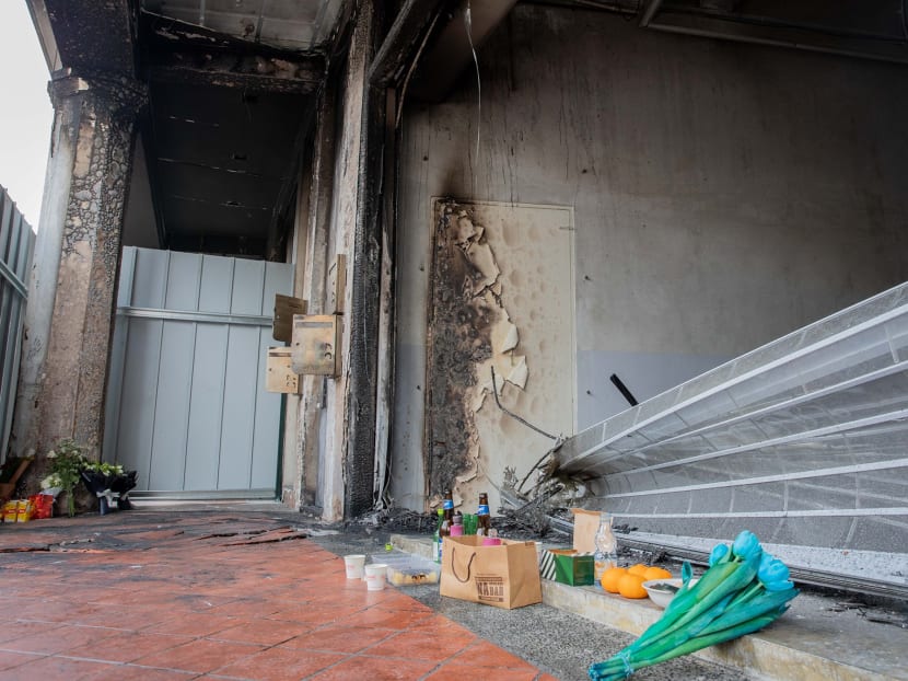 Flowers and offerings such as oranges and packet drinks were seen at the accident site on Sunday, before it was cordoned off to the public.