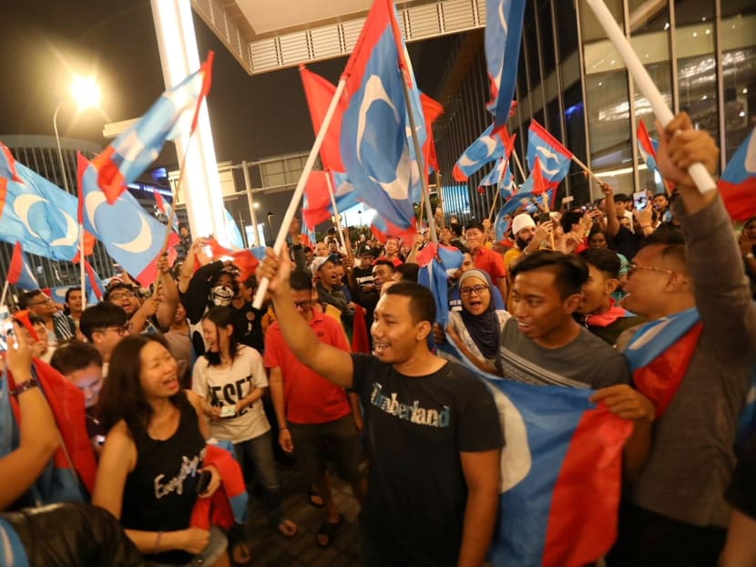 Supporters of Pakatan Harapan celebrating its stunning electoral victory in Kuala Lumpur on May 10. Supporters of Pakatan Harapan celebrating its stunning electoral victory in Kuala Lumpur on May 10.