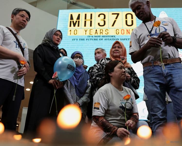 Search for missing flight MH370 to resume this month, Malaysia says