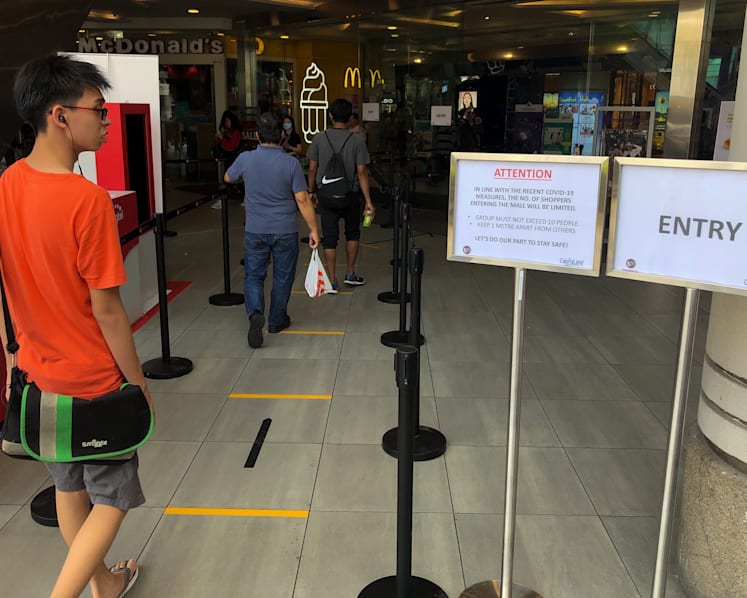 Safe distancing: Shoppers adjust to queues, floor markers as mall operators effect changes