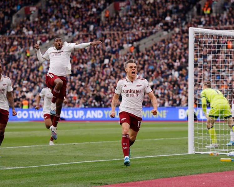 Arsenal survive huge scare to edge towards title
