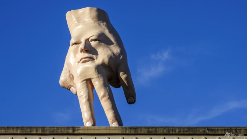 New Zealand city waves goodbye to controversial hand sculpture