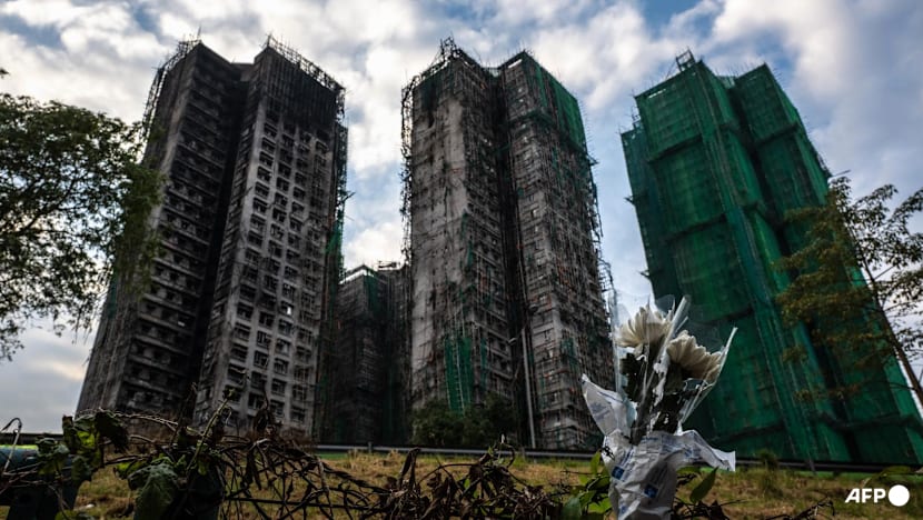 Hong Kong fire death toll hits 159 after towers searched