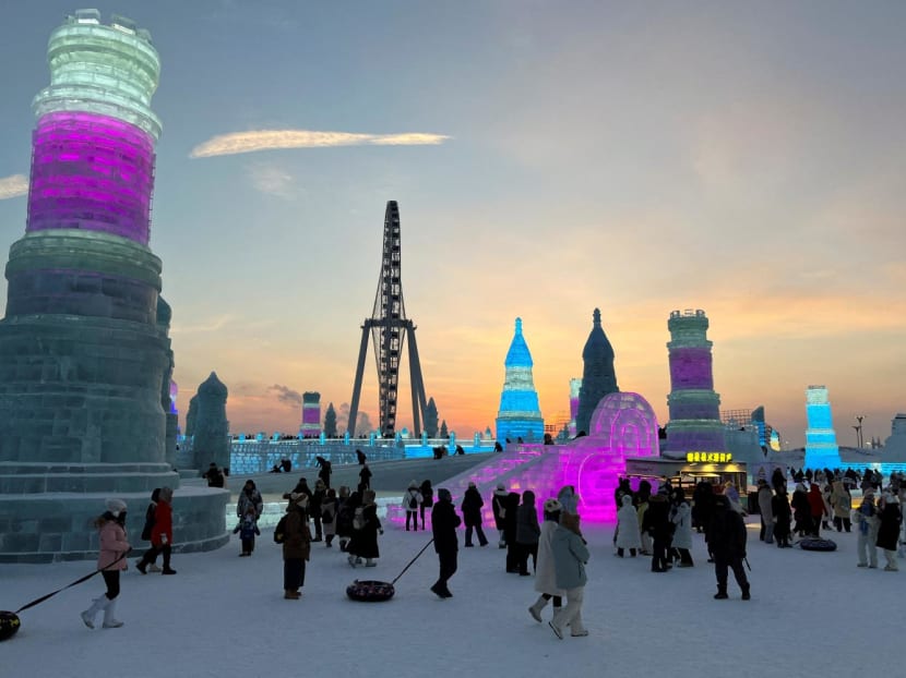 Visitors walk past ice sculptures at the Harbin Ice and Snow Festival in Harbin, Heilongjiang province, China on Dec 24, 2023. Visitors walk past ice sculptures at the Harbin Ice and Snow Festival in Harbin, Heilongjiang province, China on Dec 24, 2023.