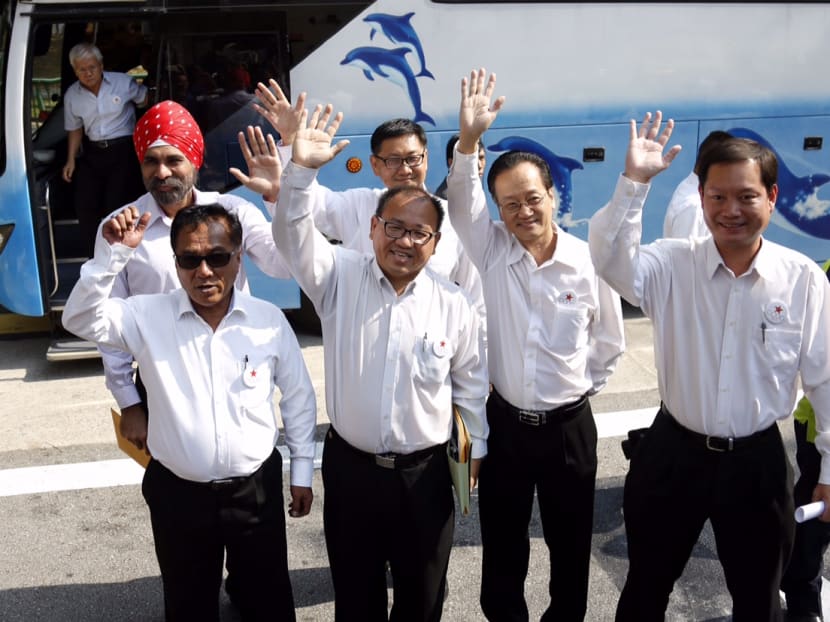Singapore Democratic Alliance (SDA)’s candidate for Punggol East SMC by-election Desmond Lim with a group of young volunteers who help him distribute promotional flyers on 18 Jan 2013. Photo by OOI BOON KEONG.
