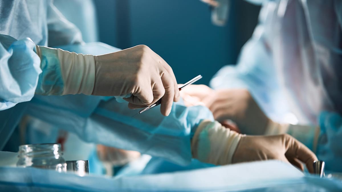 Doctor accused of causing patient’s death by cutting wrong arteries restricted from surgery for 18 months