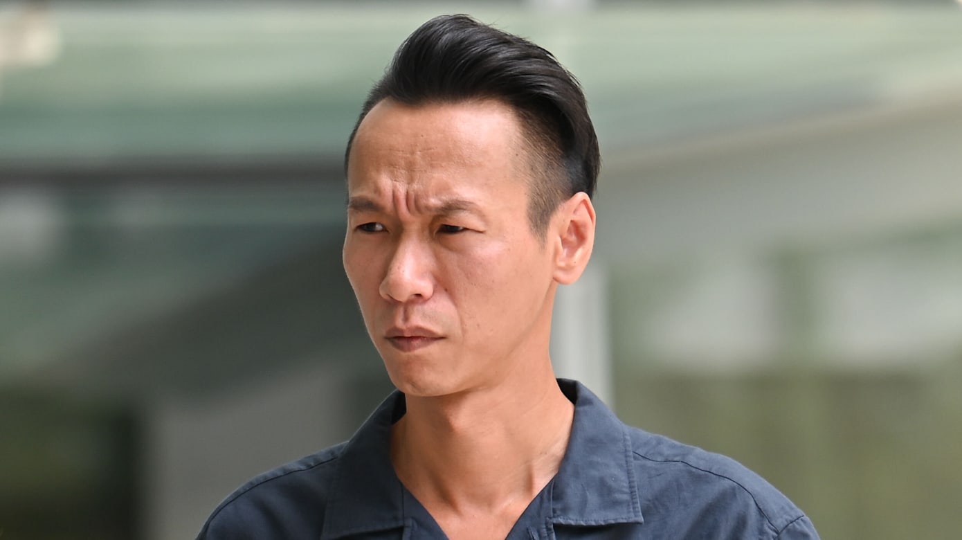 路上见司机用手机 男子路中央停车理论被判入狱九天