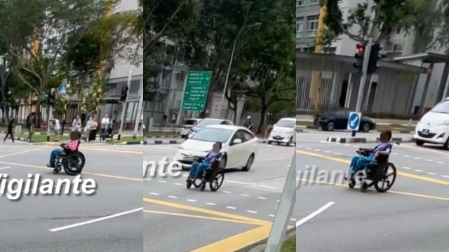 乘行动辅助工具斜穿马路 网民希望妇女停止高危行为