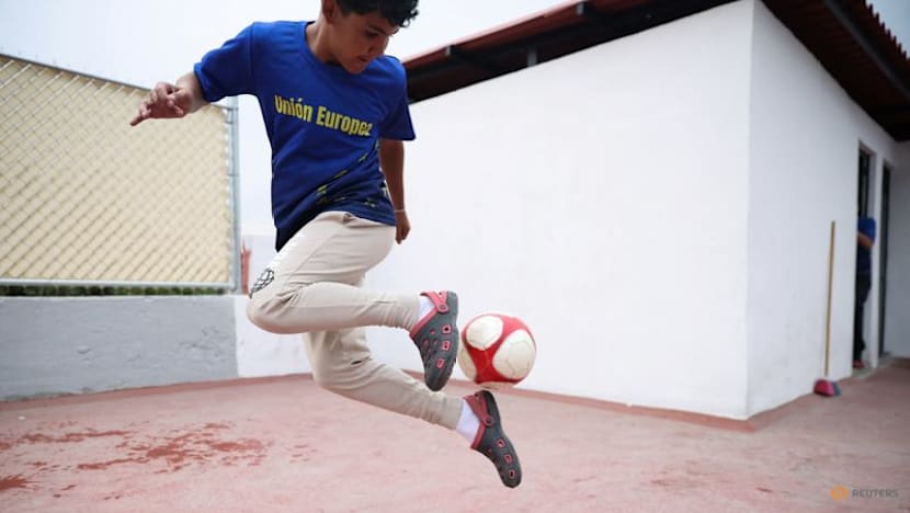 Far from home, migrant children kick off own World Cup in Mexico