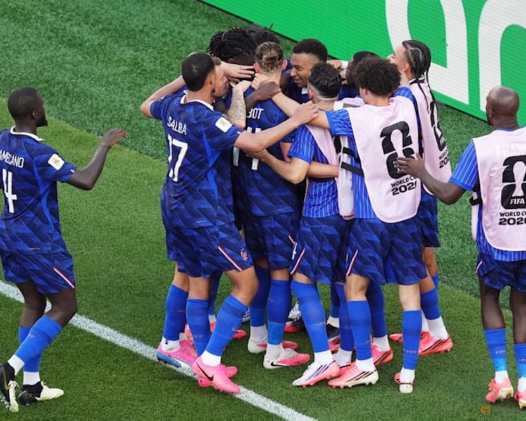 Mbappe keeps cool as France survive furnace against Paraguay