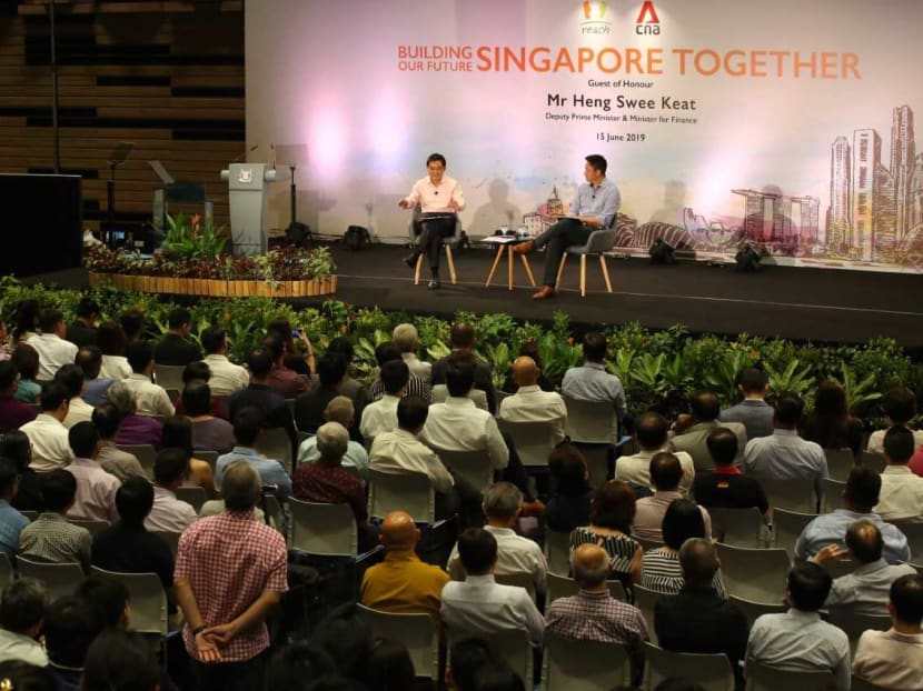 Mr Heng addressing the audience at Saturday's dialogue titled Building our Future of Singapore Together. Mr Heng addressing the audience at Saturday's dialogue titled Building our Future of Singapore Together.