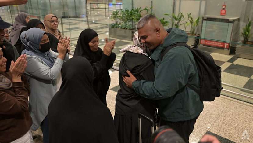 Hugs and tears of joy as Singaporeans in the Middle East return home on repatriation flight from Oman