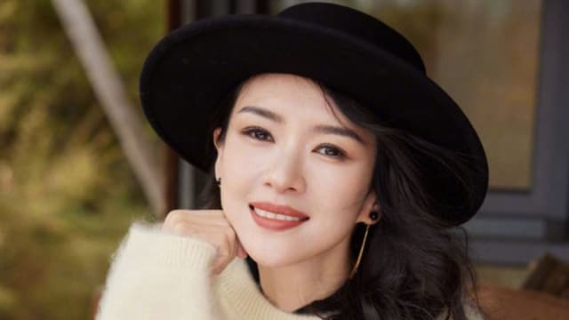离婚后首露面　章子怡落泪感谢陈可辛