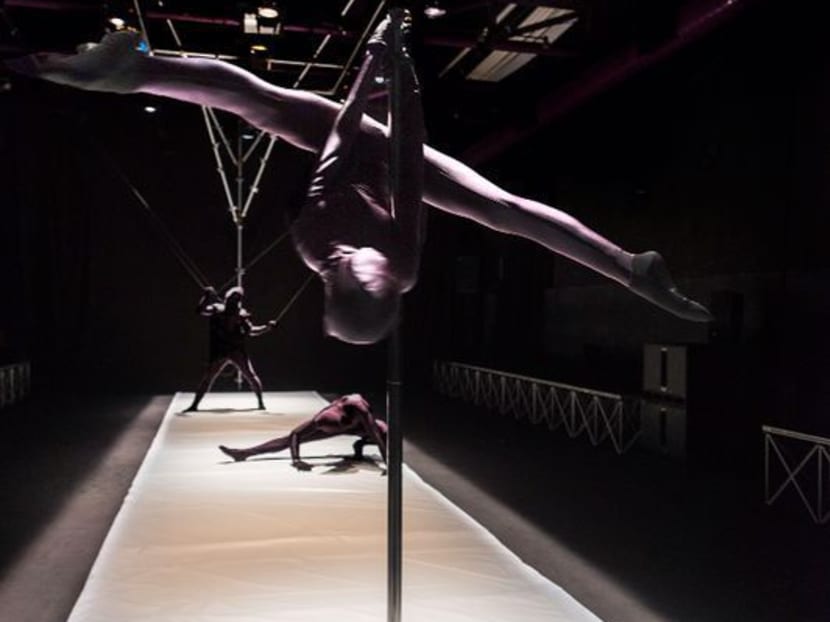 The "black ninjas" in Andy Lim's Decimal Points 0. Photo: Cake Theatrical Productions.