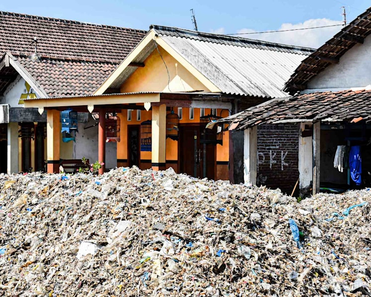The Indonesian village being buried by the developed world’s waste