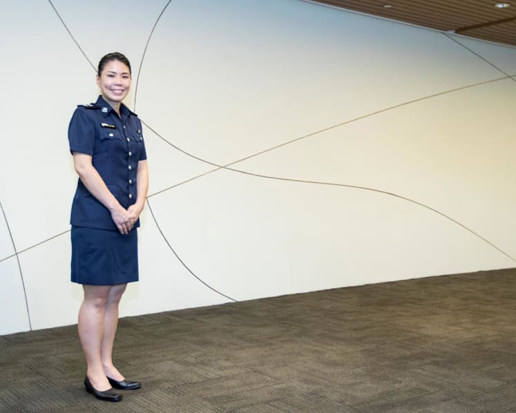 What does it take to be a female investigation officer in Singapore?