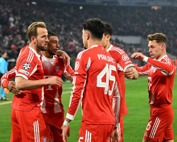 Kane double carries 10-man Bayern past Union Saint-Gilloise and into knockout stage