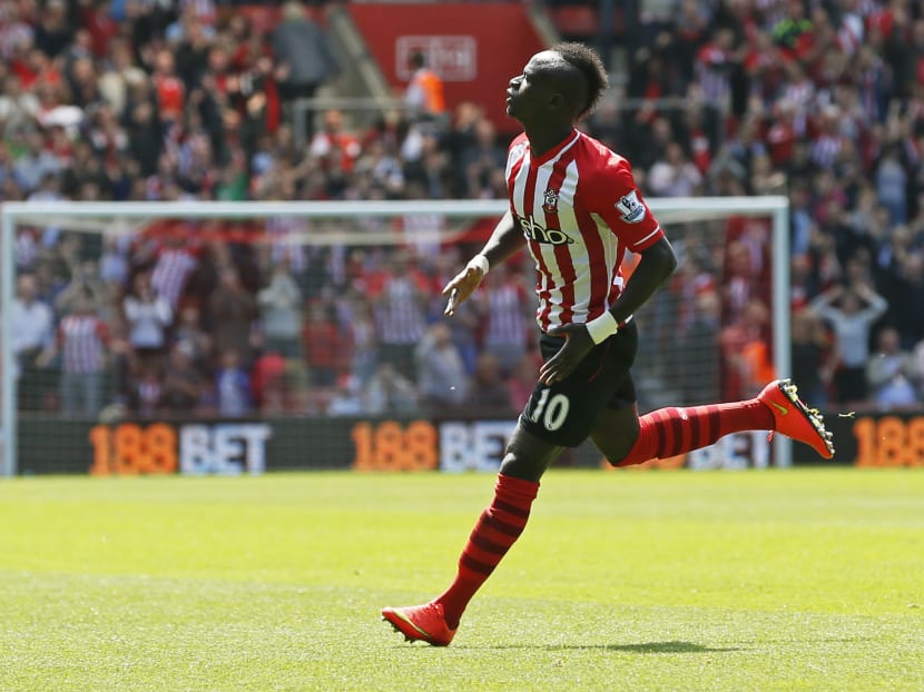 Sadio Mane celebrates scoring Southampton's third goal and completing his hat-trick. Photo: Reuters