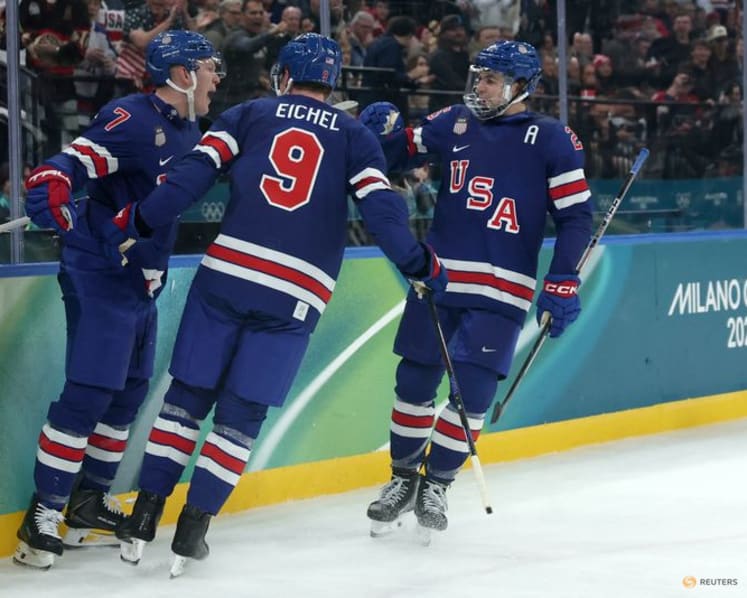 Ice hockey-Slovakia win group, US beat Denmark, Finland, Latvia notch wins