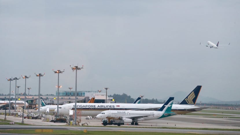 Drones, bad weather cause more flight delays at Changi Airport