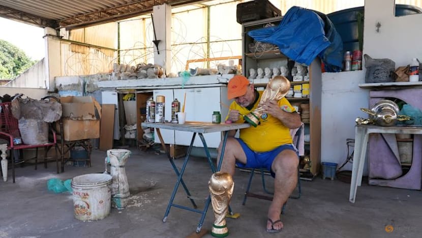 In Rio, artisan crafts World Cup trophies while hoping Brazil gets a real one