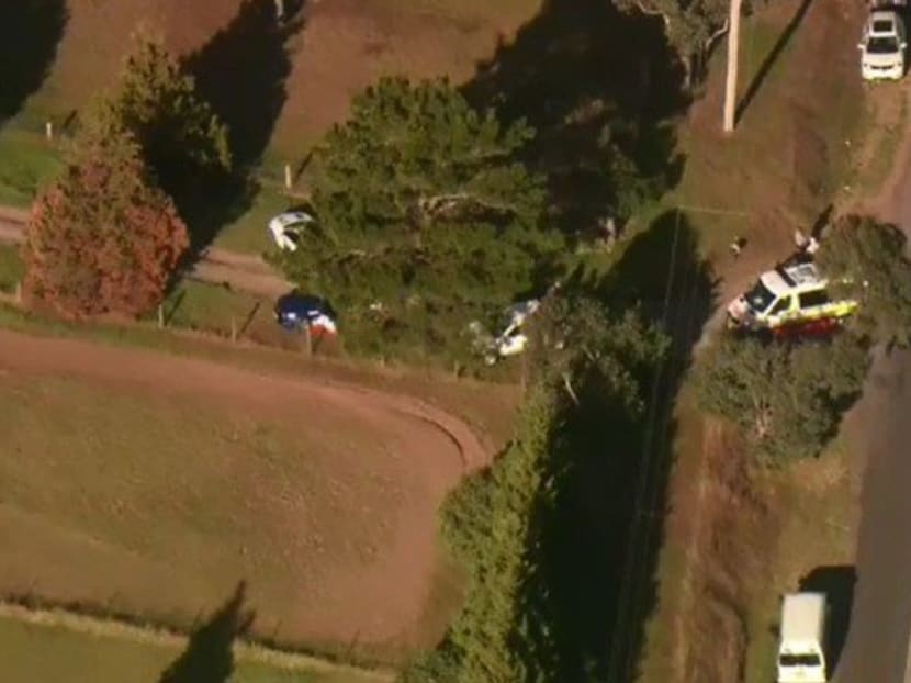 A screenshot from a video news report showing police and emergency vehicles at the scene of the accident. Photo: Nine News