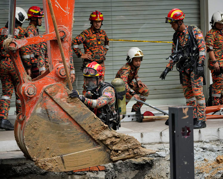 Kuala Lumpur sinkhole: A timeline of rescue efforts at the one-week mark