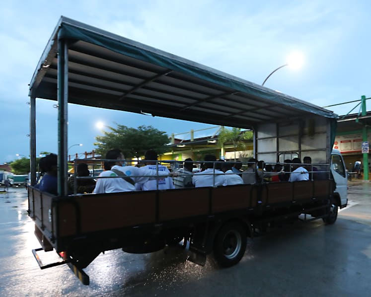 Speed limiters, co-drivers among new measures to improve safety when transporting workers on lorries: Amy Khor