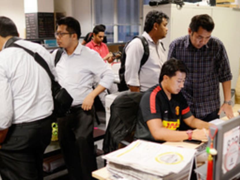 On March 30, 2015, police raided the TMI office and arrested its senior editors Jahabar Sadiq, Lionel Morais, Amin Iskandar and Zulkifli Sulong as well as The Edge Media Group publisher Ho Kay Tat under the Sedition Act over the news portal’s report on Islamic criminal laws or hudud. Photo; The Malaysian Insider