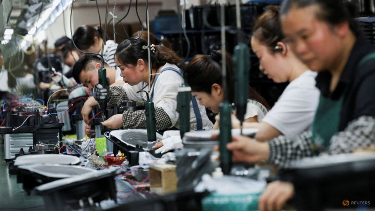 China's factory output, retail sales growth worst in over a year