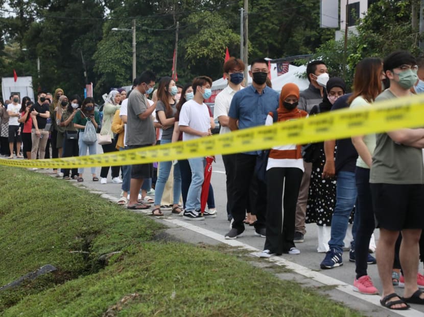 People waiting in line outside a polling centre in Tambun to cast their votes in Malaysia’s 15th general election on Nov 19, 2022. People waiting in line outside a polling centre in Tambun to cast their votes in Malaysia’s 15th general election on Nov 19, 2022.