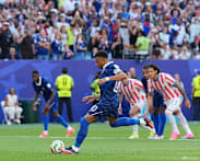 France battle past Paraguay to set up Morocco World Cup showdown