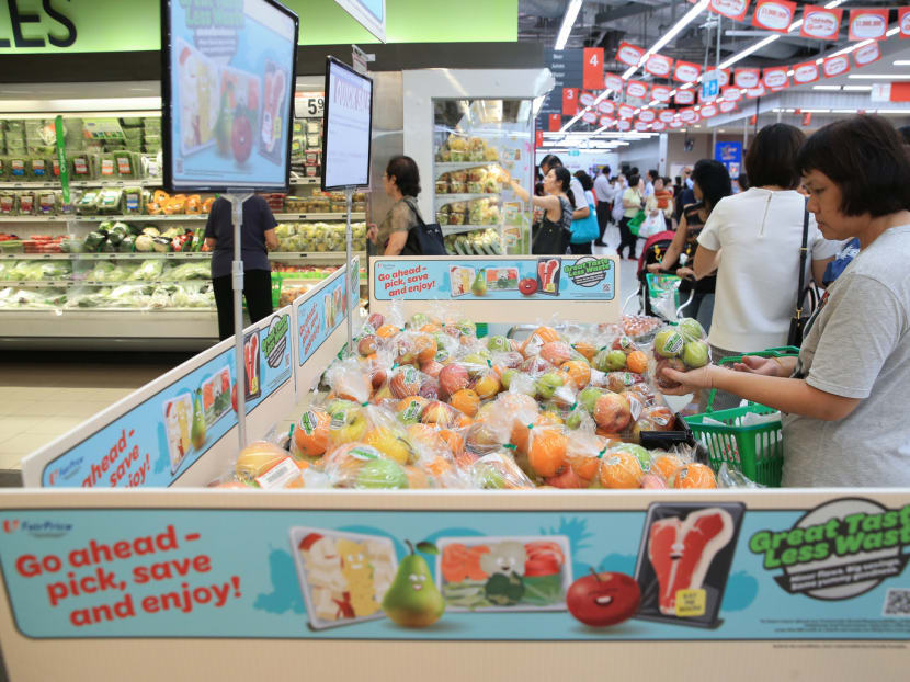 Under FairPrice's Great Taste Less Waste initiative, fruits and vegetables are repackaged to make them more attractive to consumers. Photo: Wee Teck Hian