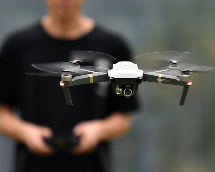 Man charged with illegally flying drone to take pictures of MINDEF's Gombak Base, Gali Batu Depot